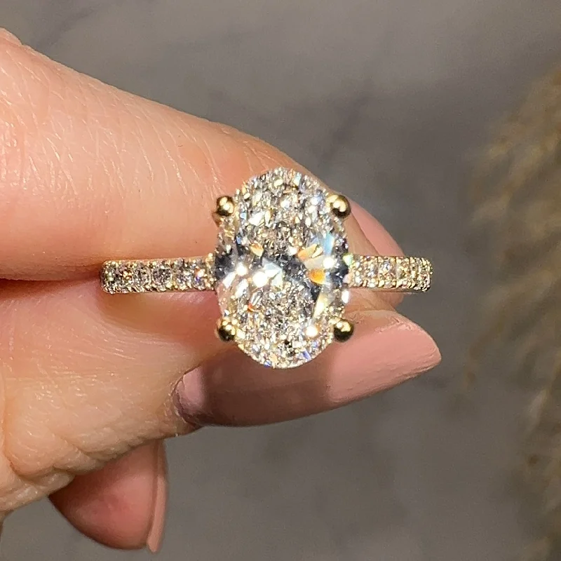 Ladies engagement rings three-stone-"Raquel" Hidden Under Halo 1.90 Carat Oval Cut Diamond Shoulders Yellow Gold Engagement Ring