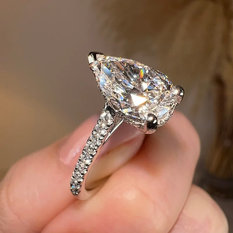 Ladies engagement rings e-commerce sites-"Bambi" Under Hidden Halo 3 Carat Pear Cut Diamond Shoulders Engagement Ring