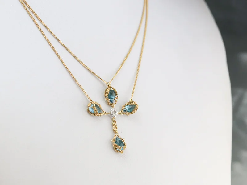 Gold Blue Topaz and Diamond Cross Necklace