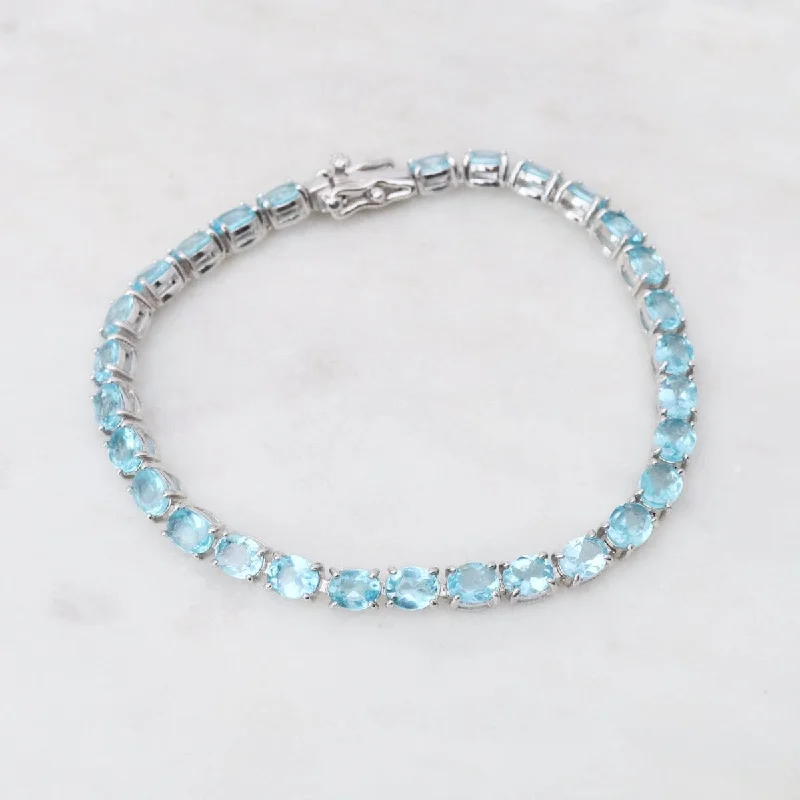 Ladies bracelets diamond accents-Oval Blue Apatite Tennis Bracelet