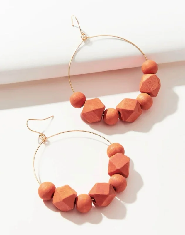 Ladies rings store locations-Orange Beaded Hoop Earrings